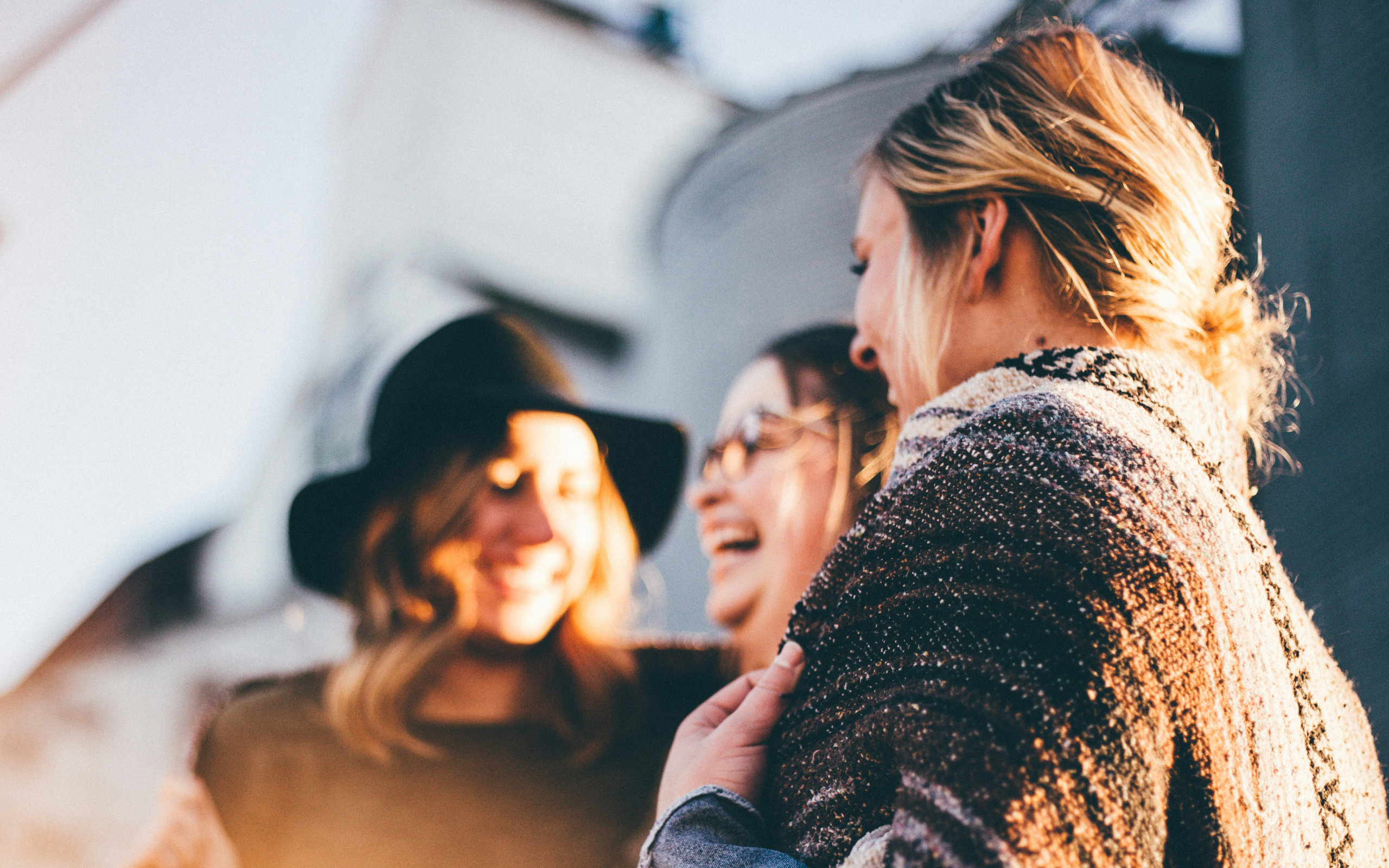 Women laughing together in genuine connection